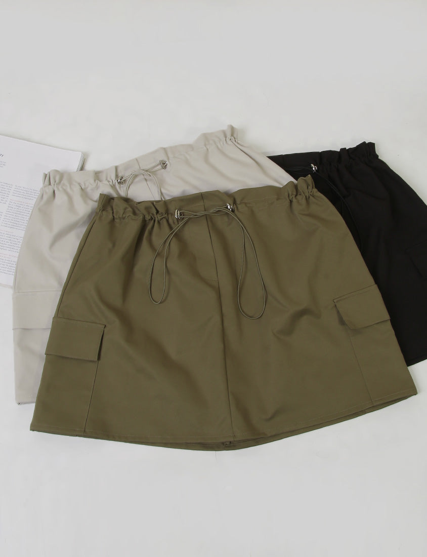 Sweet & Edgy Drawstring Cargo Plus Size Mini Skirt (With Inner Shorts)