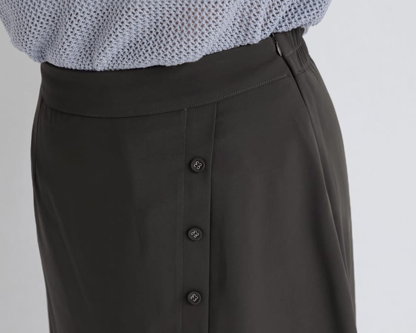 MISS. Korean Style Asymmetrical Button Slit Elastic Waist Plus Size Maxi Skirt